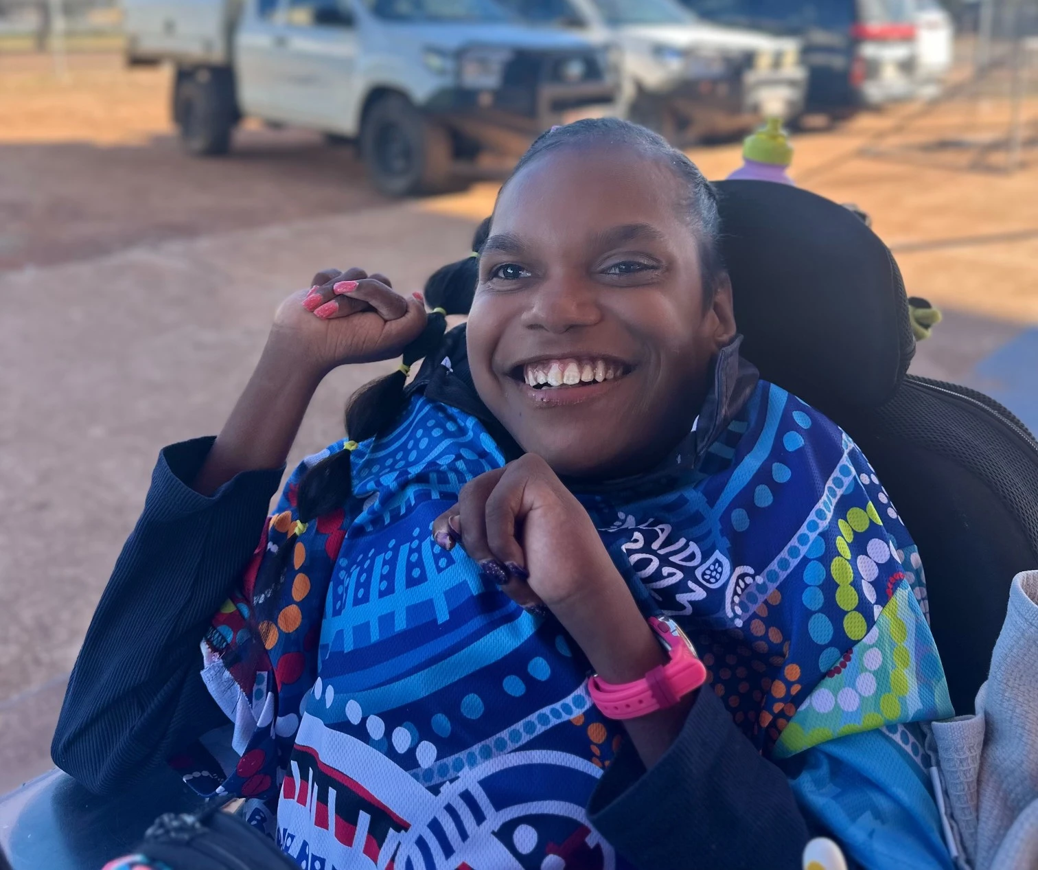 portrait of a smiling disabled women on wheelchair